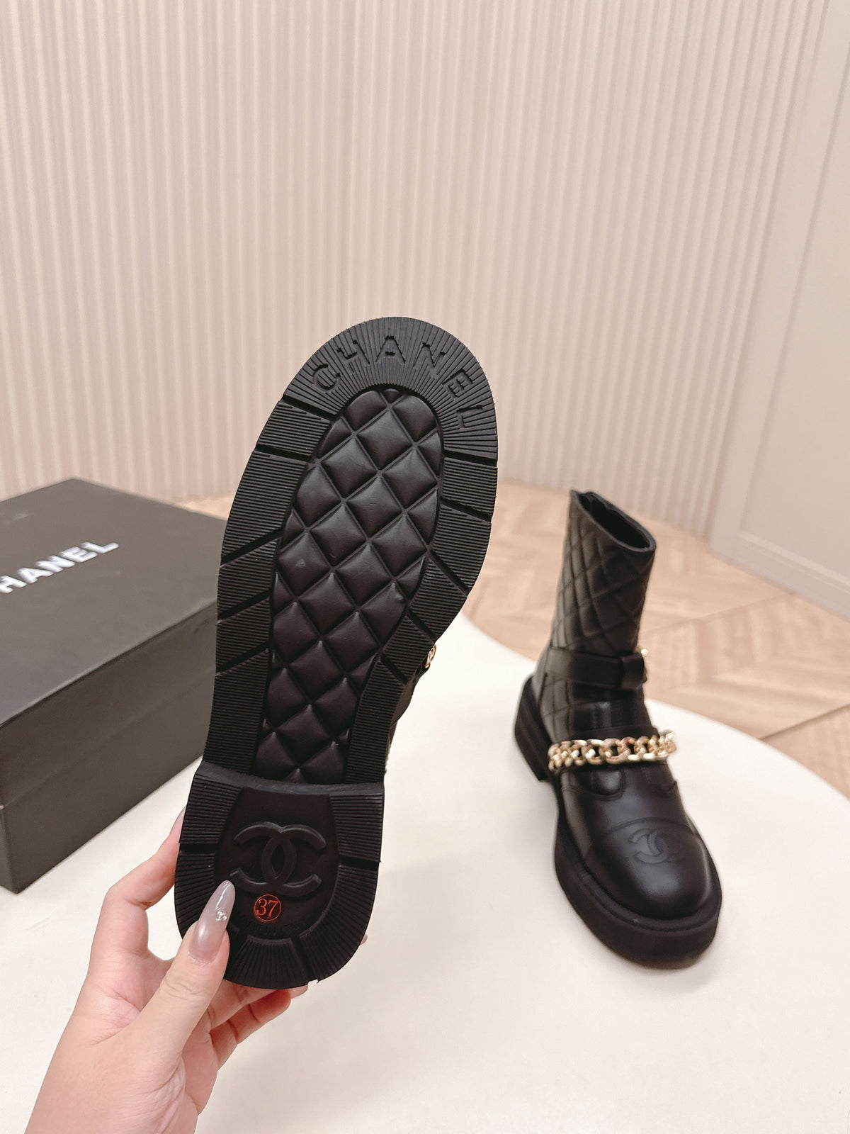 CHANEL ANKLE BOOTS 25S IN BLACK LAMBSKIN EMBOSSED LOGO WITH GOLD HARDWARE