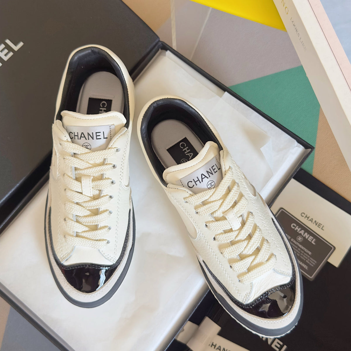 CHANEL 25S SNEAKERS WITH PATENT TOE 20MM IN WHITE CALFSKIN