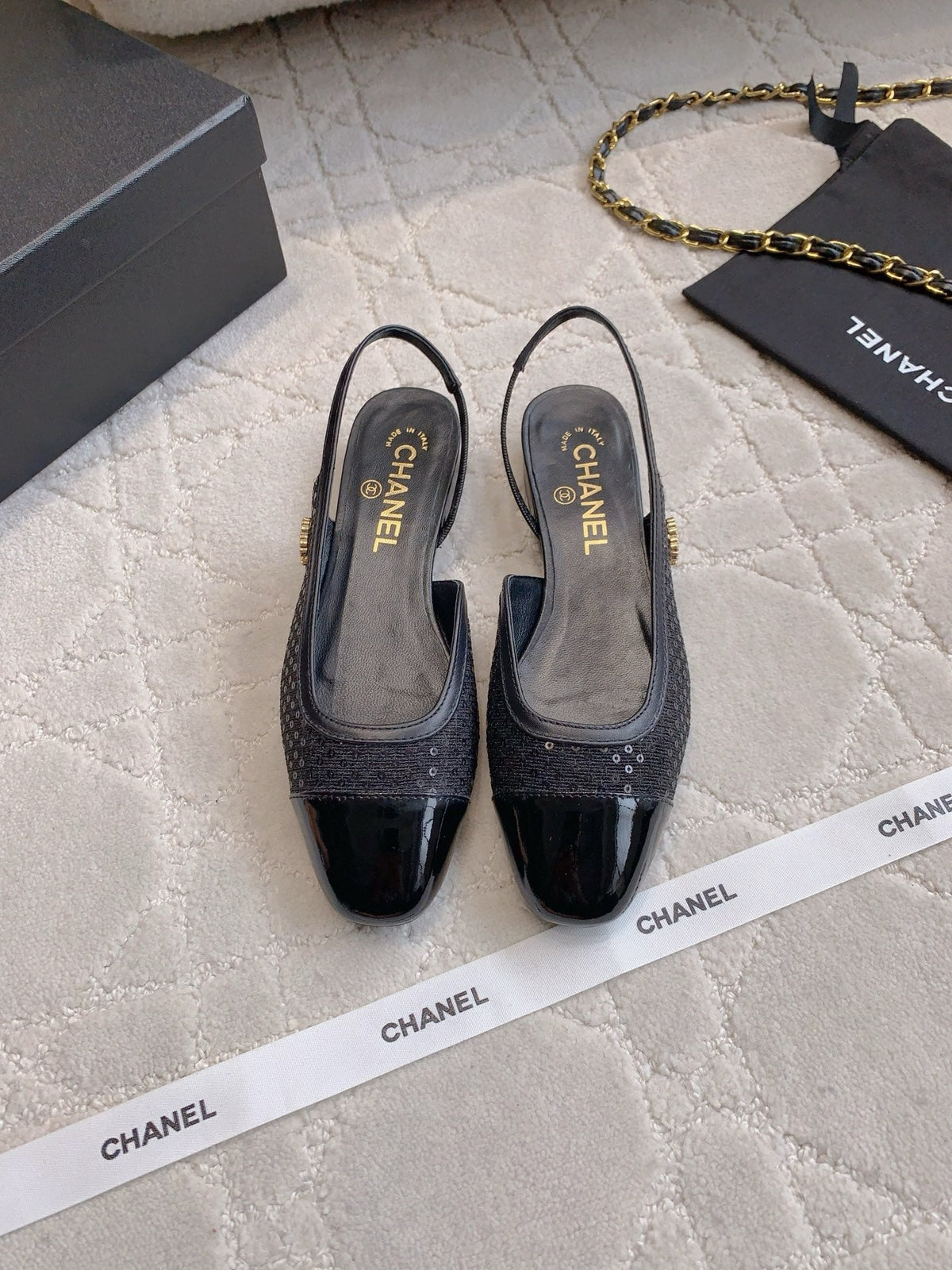 CHANEL 25S SLINGBACK IN SPARKLING BLACK CALFSKIN AND CANVAS GOLD HARDWARE