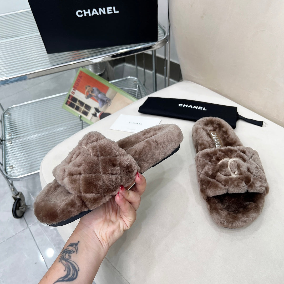 CHANEL 25S FUR SLIPPERS WITH EXPOSED-STITCH STRAPS IN DARK BROWN