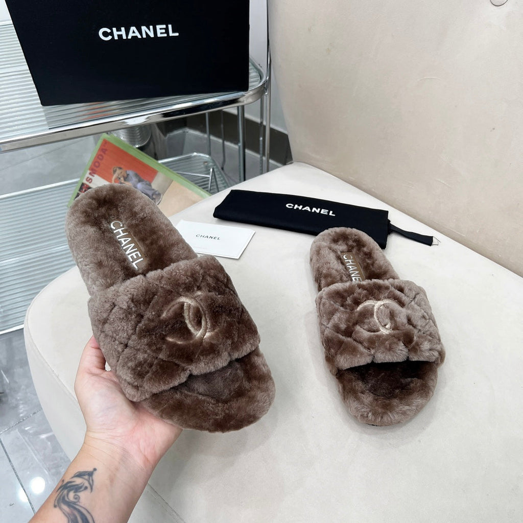 CHANEL 25S FUR SLIPPERS WITH EXPOSED-STITCH STRAPS IN DARK BROWN