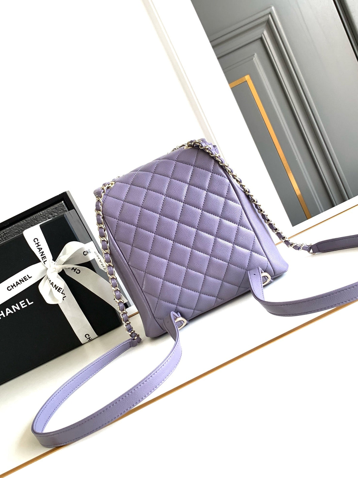 CHANEL 25S BACKPACK 17.5 CM IN PURPLE LAMBSKIN